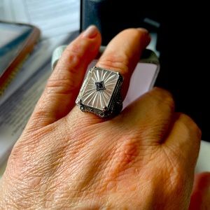 Art Deco style ring with camphor glass and center amethyst stone.